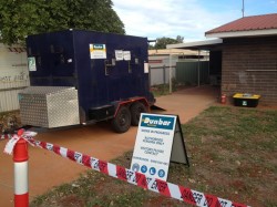 Demarcation of work area with signage in place and site muster point box visible